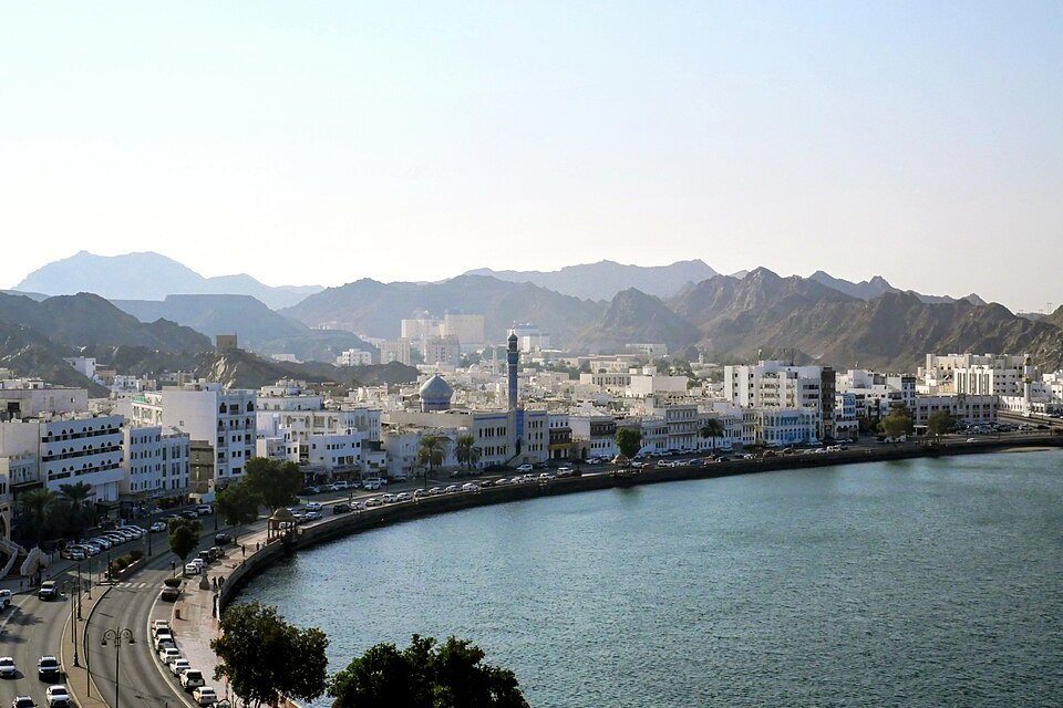 White buildings along Muttrah Corniche in Muscat