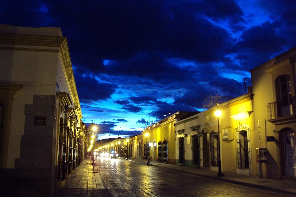 Illuminated street in central Oaxaca at dusk