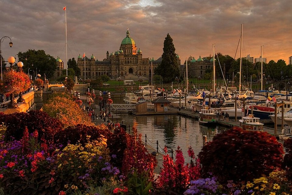 Victoria Inner Harbour and illuminated Parliament Buildings at dusk